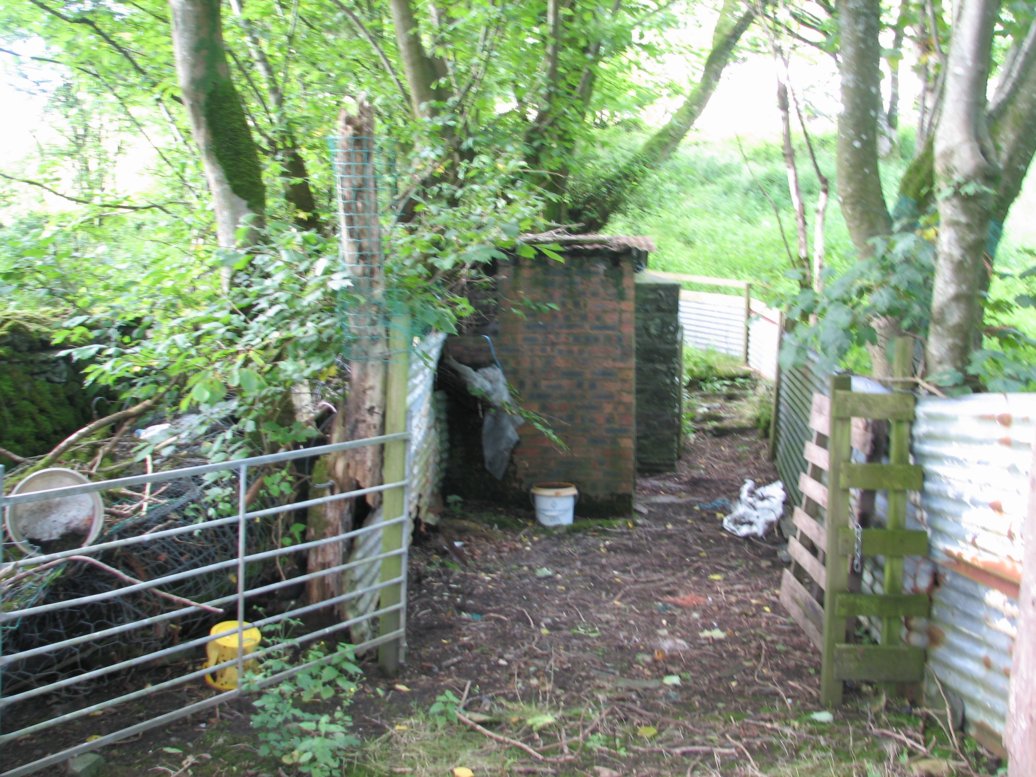 This little building was originally the pump house for the well (which now is too close to the septic tank outflow to be used for potable water) and has since been used to house animals. Lots of potential - no definite plans yet!