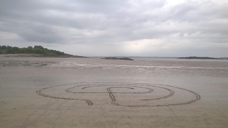 Not our house, but close: Carrick beach is fabulous for creating - and walking - a simple labyrinth